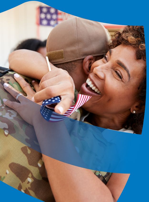 military son hugging mom