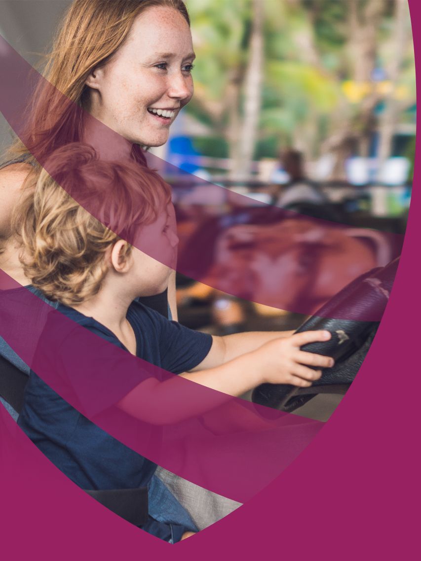 mom and son in bumper car